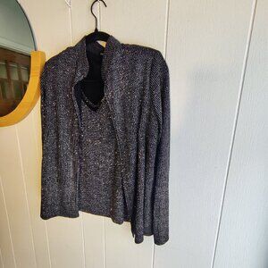 Onyx designed Ultra Sparkle Jacket and V-neck Tank, in reflective silver & gold.